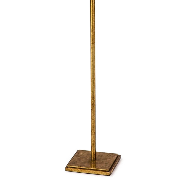 Gold base of a feather floor lamp